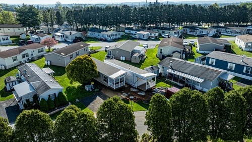 Aerial view of a mobile home park, representing real estate investment opportunities in self-directed IRAs